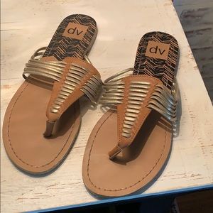 Tan and gold sandals